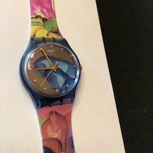 Multi-color Swatch watch LIKE NEW, oversized face, silicone band, horses print
